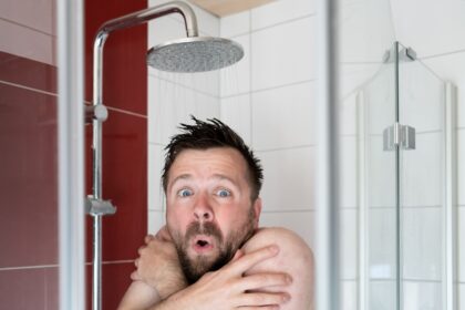 Man takes a cold shower