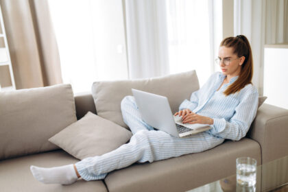 Woman working in pajamas